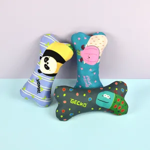 Cute bone-shaped dog chew toy with funny cartoon prints, durable pet teething toy for fun.