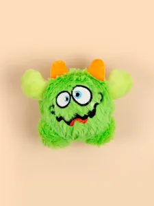 Funny green monster plush pet toy with orange horns and big eyes, soft and cute dog toy.