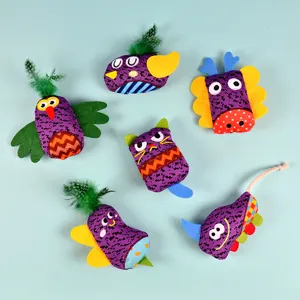 Cute purple fabric cat toy set with feathers and various shapes for interactive play.