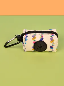 Portable dog waste bag dispenser with cute heart pattern and carabiner for easy outdoor walks.