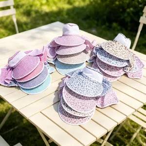 Detailed view of floral and plaid sun hats, wide brim outdoor tea picking mesh hats for women.