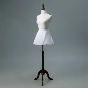 White short petticoat detail showing elastic waist and puffy layered crinoline design.