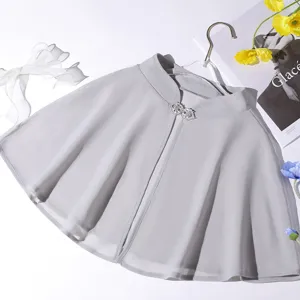 Elegant women's short chiffon cape in light grey with sparkling rhinestone buckle.