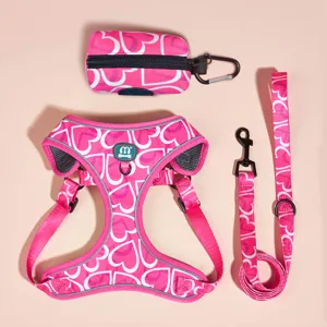 Pink heart pet harness leash set, adjustable dog cat vest with waste bag holder for walking.