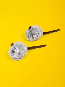 Closeup view of grey simulation plush mouse cat toys with brown tails on vibrant yellow background.