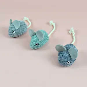 Detailed view of grey and blue knitted plush mouse cat toys with rope tails for pets.