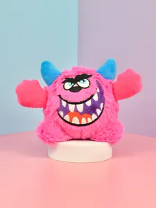 Cute pink monster plush pet toy with blue horns, funny squeaky chew toy for dogs and kids.