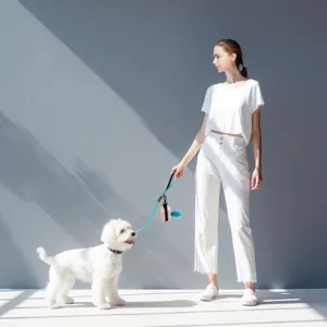 Portable dog leash and poop bag dispenser set, cute miniature design for outdoor walking.