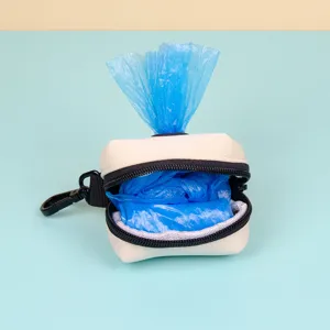Portable pet waste bag dispenser with blue trash bags, mini dog poop holder for outdoor walking.