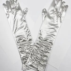 Detail view of silver satin gathered long gloves, glossy fabric, elegant bridal accessory.