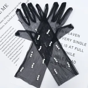 Black mesh pearl gloves detail showing delicate sheer fabric and elegant beaded decoration for kids.