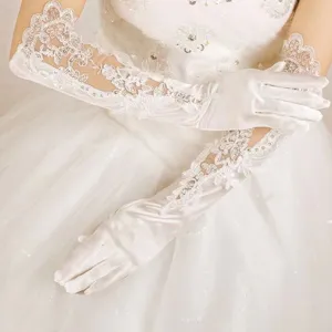 Elegant long white satin wedding gloves featuring intricate lace and sparkling sequin embroidery.