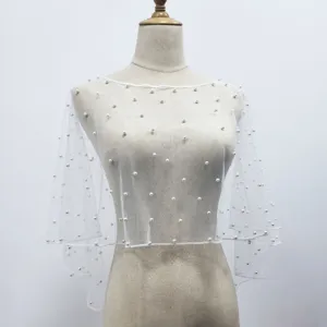 Elegant white sheer mesh capelet embellished with pearls for bridal and evening wear.