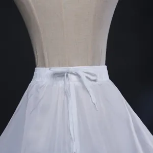 White crinoline underskirt detail showing elastic waistband and adjustable drawstring.