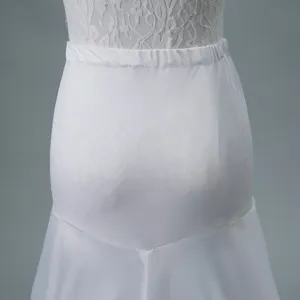 White wedding dress petticoat detail showing elastic waist and lace trim crinoline.