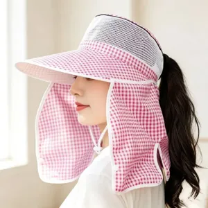 Detail shot of the pink gingham sun protection hat, highlighting the breathable mesh top and wide brim.