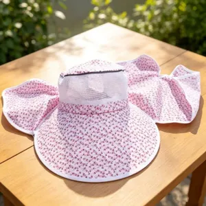 Floral print sun hat featuring breathable mesh top and wide brim for outdoor shade.