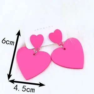 Boucles d'oreilles pendantes en acrylique double cœur rose pour femmes bijoux mode.