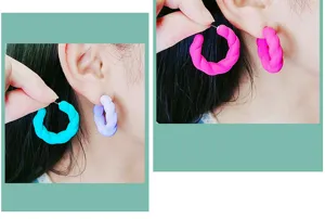 Close-up detail showcasing the vibrant candy colored twisted hoop design and acrylic texture.