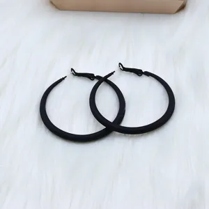 Classic black metal hoop earrings for women, minimalist geometric fashion ear jewelry daily wear.