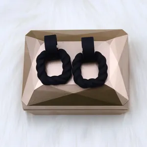 Black geometric twist stud earrings for women, stylish matte hollow out earrings, fashion jewelry.