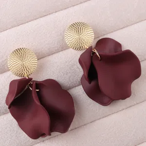 Elegant wine red petal earrings with gold round studs, stylish accessories for women.