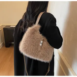 Plush bucket bag for women, stylish faux fur shoulder bag with metal lock and strap for autumn.
