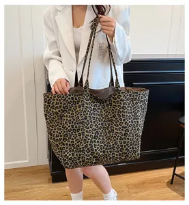 Leopard print canvas tote bag for women, large capacity casual single shoulder handbag fashion.