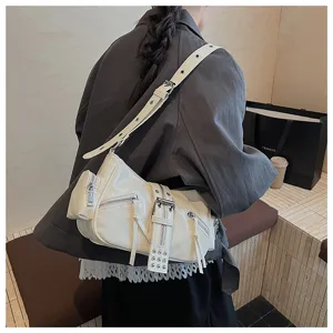Stylish oil wax leather motorcycle shoulder bag for women, chic commuter underarm handbag.