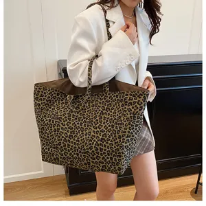 Stylish leopard print canvas tote bag for women, perfect large capacity casual shoulder bag.