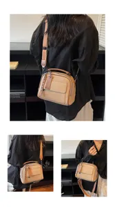 Detailansicht der minimalistischen Umhängetasche aus weichem Leder mit Fronttasche.