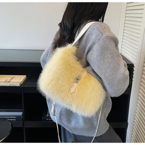 Close-up view of the fluffy yellow shoulder bag with soft faux fur and stylish metal lock.