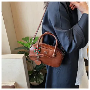 Braune retro bowlingtasche für damen schicke pu leder umhängetasche stilvolle handtasche freizeit
