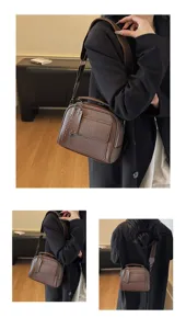 Detailansicht der braunen Lederschultertasche mit weicher Textur, Riemen und Vordertasche.