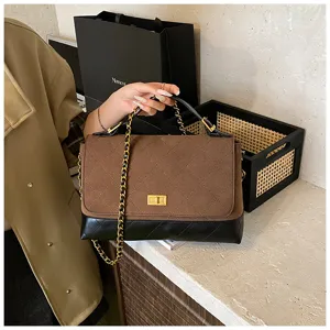 Brown suede patchwork flap bag with quilted design, elegant chain strap and metal turn-lock closure.