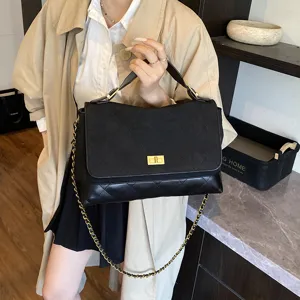 Black quilted chain shoulder bag, stylish flap crossbody tote for women commuting daily use.