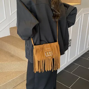 Suede fringe crossbody bag for women, retro casual shoulder bag with metal buckle detail.