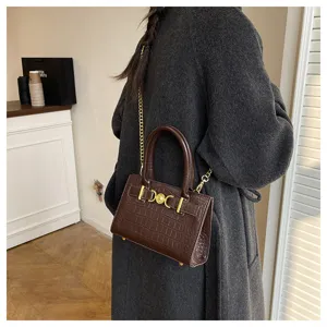 Luxe handtas met krokodillenpatroon, elegante schoudertas voor moderne vrouwen.