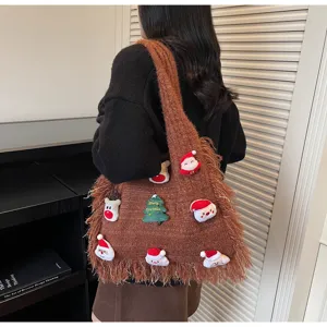 Christmas knitted tote bag with cute plush Santa patches and stylish fringe details.