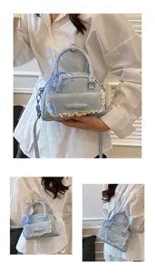 Blue soft leather handbag featuring delicate lace trim and blue checkered bow detail.