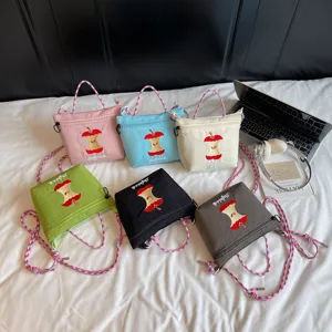 Cute Japanese style nylon crossbody bag with cute apple embroidery and colorful strap main image