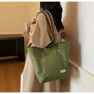 Green plaid canvas tote bag with thick rope strap for daily casual wear and large capacity.