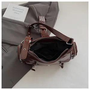 Dark brown leather motorcycle shoulder bag with multi-pocket and buckle design stylish