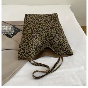 Leopard canvas tote bag for women, casual large capacity shoulder bag, stylish autumn style.