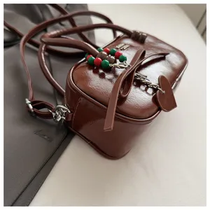 Vintage braune Bowling Umhängetasche mit Schleife, elegante PU Leder Handtasche.