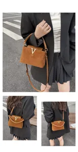 Fall vintage brown suede crossbody bag with gold V hardware, chic commute shoulder handbag.