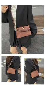 Brown suede crossbody bag for women, retro V-logo shoulder handbag with top handle for autumn commute.