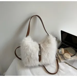 Chic autumn winter fluffy plush shoulder crossbody bucket bag with brown leather strap.
