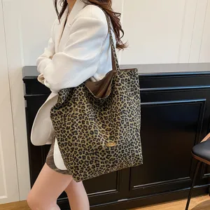 Leopard print canvas tote bag for women, casual large capacity shoulder bag for daily wear.