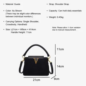 Elegant black suede top-handle shoulder bag featuring a metallic V-logo and adjustable strap.